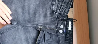 Pantalón skinny gris talla 34