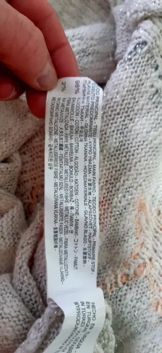 Jersey beige con estrellas multicolor