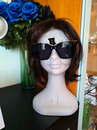 Occhiali da sole Naj Oleari con lenti trapezoidali