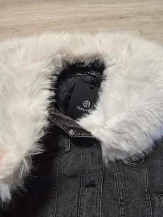 Casaco ganga preto com pêlo branco