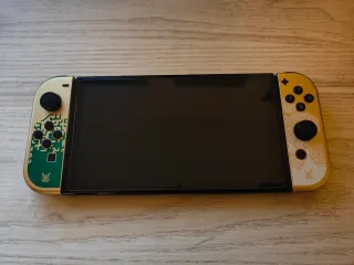 Nintendo Switch OLED Edizione Zelda + 4 Giochi