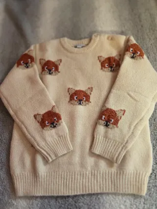 Camisola com capuz e riscas