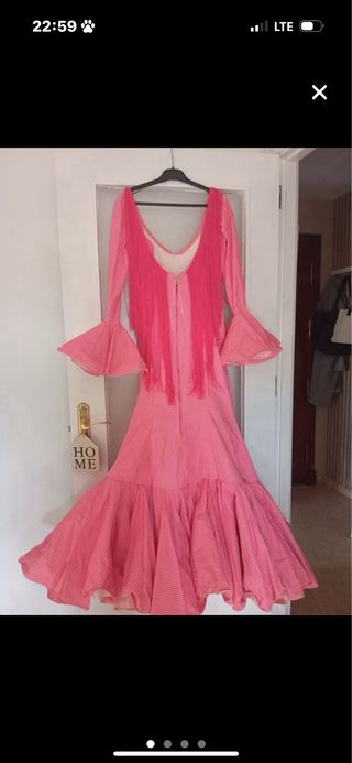 Traje de flamenca rosa volantes