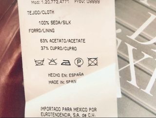 Blusa seda sin mangas con cinturón