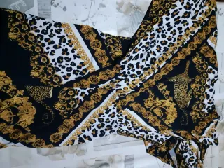 Mono FASHIONOVA estampado leopardo y oro