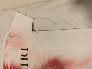 Maglietta Amiri bianca con stampa spray