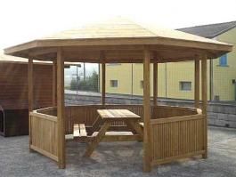 Casa de madera con terraza y porche