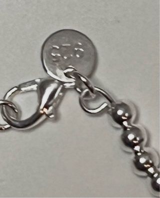 Pulsera de bolitas plateadas