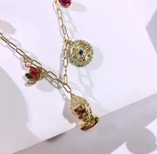 Pulsera Swarovski Buda y Loto Dorada