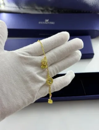 Pulsera Swarovski Buda y Loto Dorada