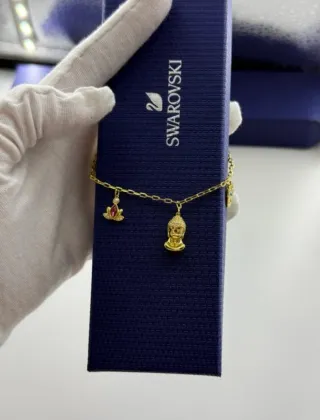 Pulsera Swarovski Buda y Loto Dorada