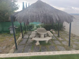 Conjunto mesa y bancos jardín piedra