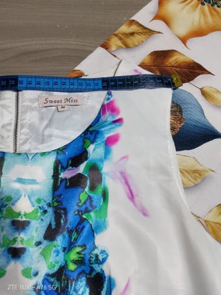 Abito fantasia floreale bianco