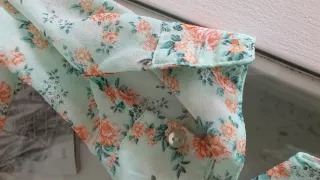 Blusa floral verde y naranja