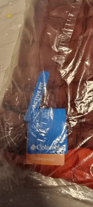 Plumas Columbia Naranja y Marrón