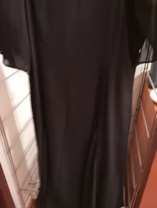 Vestito nero maniche pipistrello