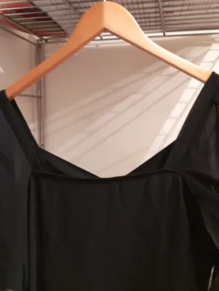 Vestito nero maniche pipistrello