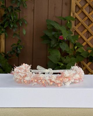 Corona de flores preservadas