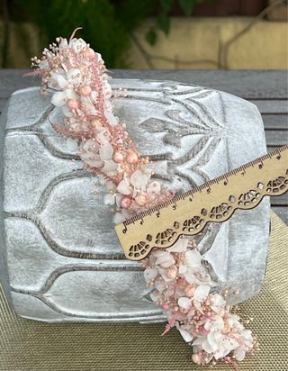 Corona de flores preservadas