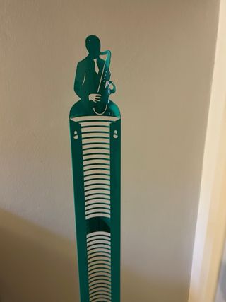 Porta CD design moderno figura sassofonista