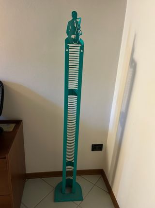 Porta CD design moderno figura sassofonista