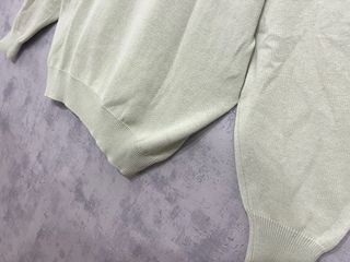 Jersey verde con cuello polo y estampado