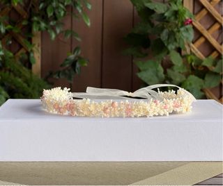 Corona de flores preservadas