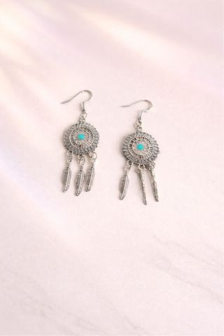 Pendientes plateados con turquesa