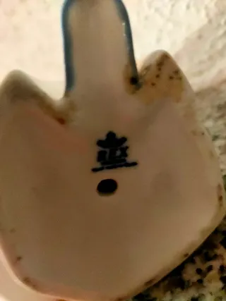 Figura porcelana niña con osito