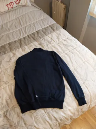 Chaqueta de rayas azul y marrón