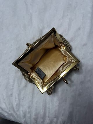 Bolso de mano dorado con pedrería vintage