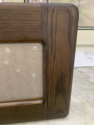 Cornice in legno con decorazioni