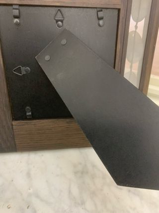 Cornice in legno con decorazioni