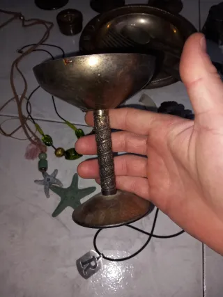 Lote de copas, cubiertos y joyas antiguas