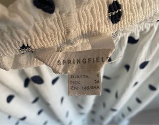 Blusa blanca lunares azul marino