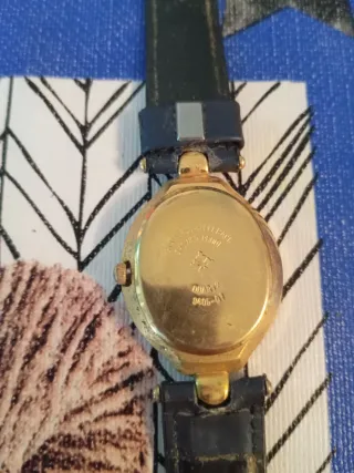 Reloj Potencial Azul y Dorado
