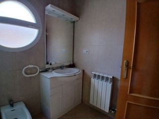Casa adosada en venta en Tomelloso