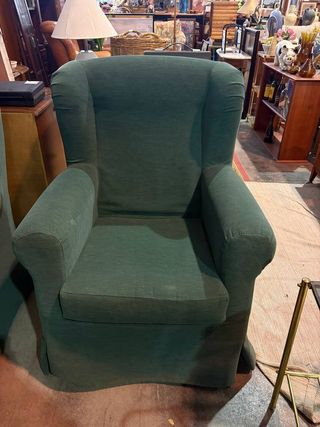 SILLÓN VERDE OSCURO CON COJINES