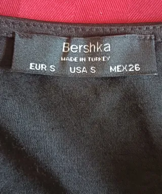 Maxi Abito nero elasticizzato incrociato