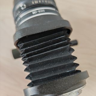 Macro Minolta 100mm f4 con bellows y adaptador