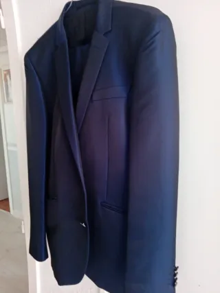 Lote abrigos de mujer trajes de hombre negociable