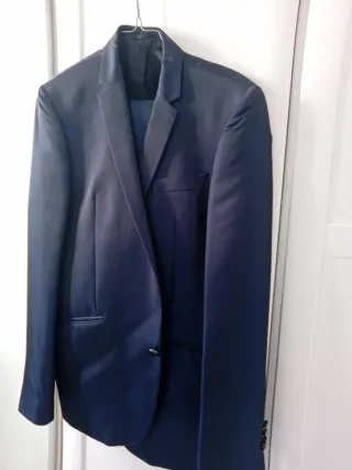 Lote abrigos de mujer trajes de hombre negociable