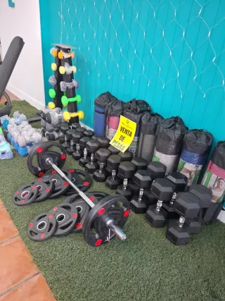 4 discos olímpicos 2 de 5kg y 2 de 2,5kg