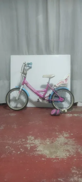 bicicleta infantil 16 pulgadas con ruedines.