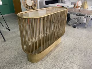 Consola metal dorado y cristal ovalada