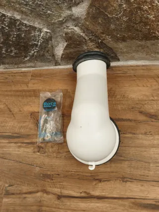 Manguito WC acodado 21cm pared 110mm