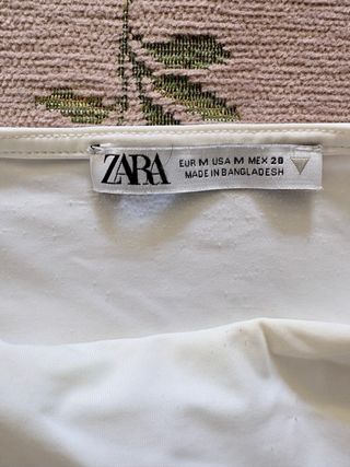 Camiseta blanca drapeada