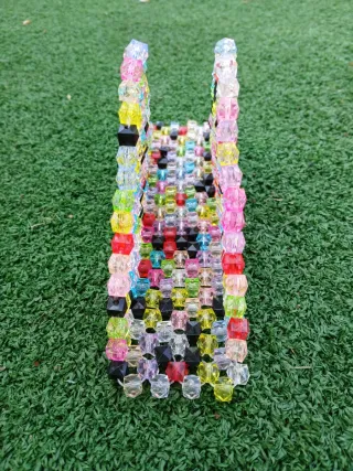 Portatovaglioli triangolare colorato