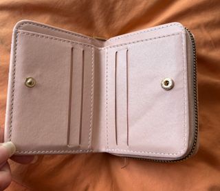 Monedero tejido rosa