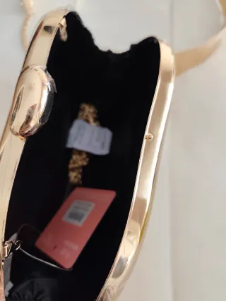 Bolso de mano dorado